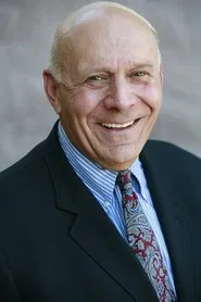 Milt Kogan — Medical Examiner