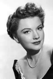 Anne Baxter — Nora Chandler